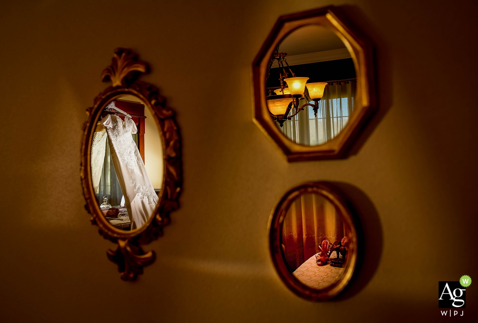 The three mirrors on the wall reflected the bride's beautiful dress, vibrant bouquet, and  chandelier lights