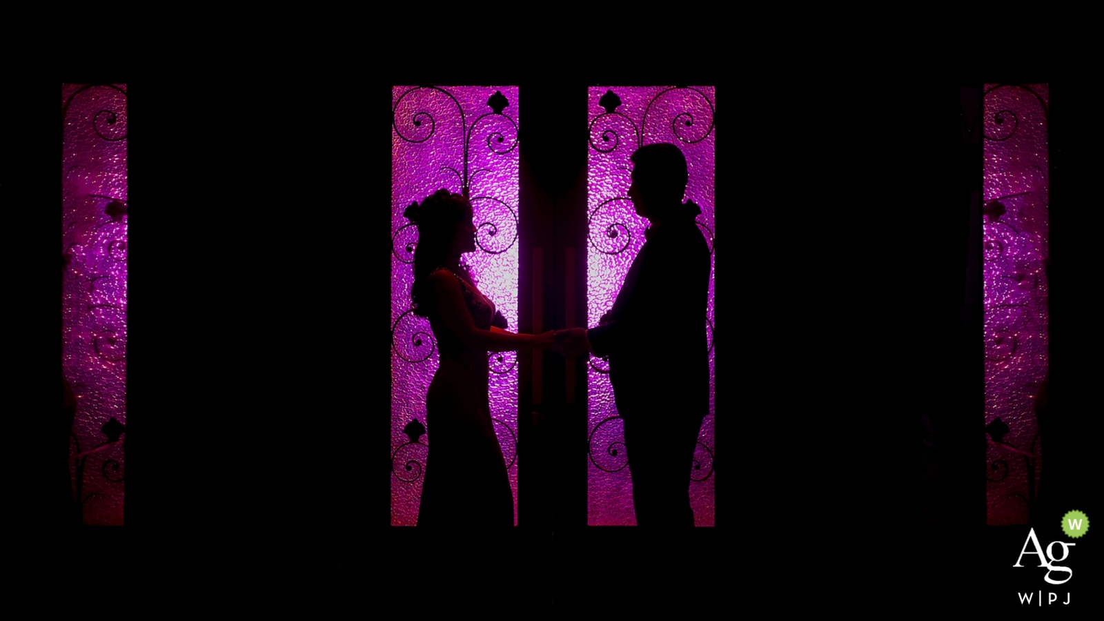 Beijing wedding portrait of the couple silhouetted in the windows of a doorway