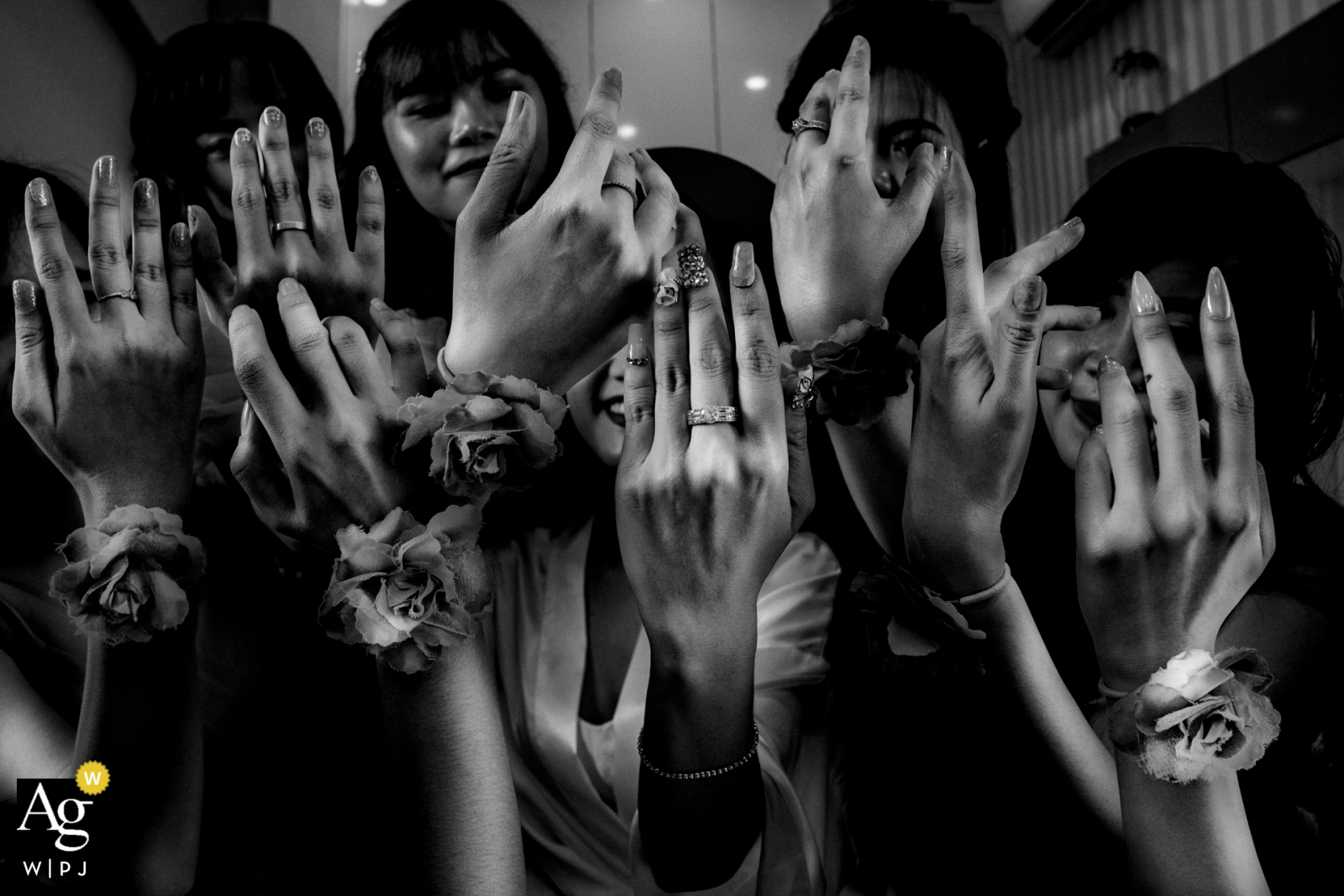 Photo by: <a href="https://www.wpja.com/photos/artistic-wedding-photographers/2440281">Vu Nguyen - Ho Chi Minh Vietnam wedding photos at the Bride house | Hand, rings details with the bridesmaids