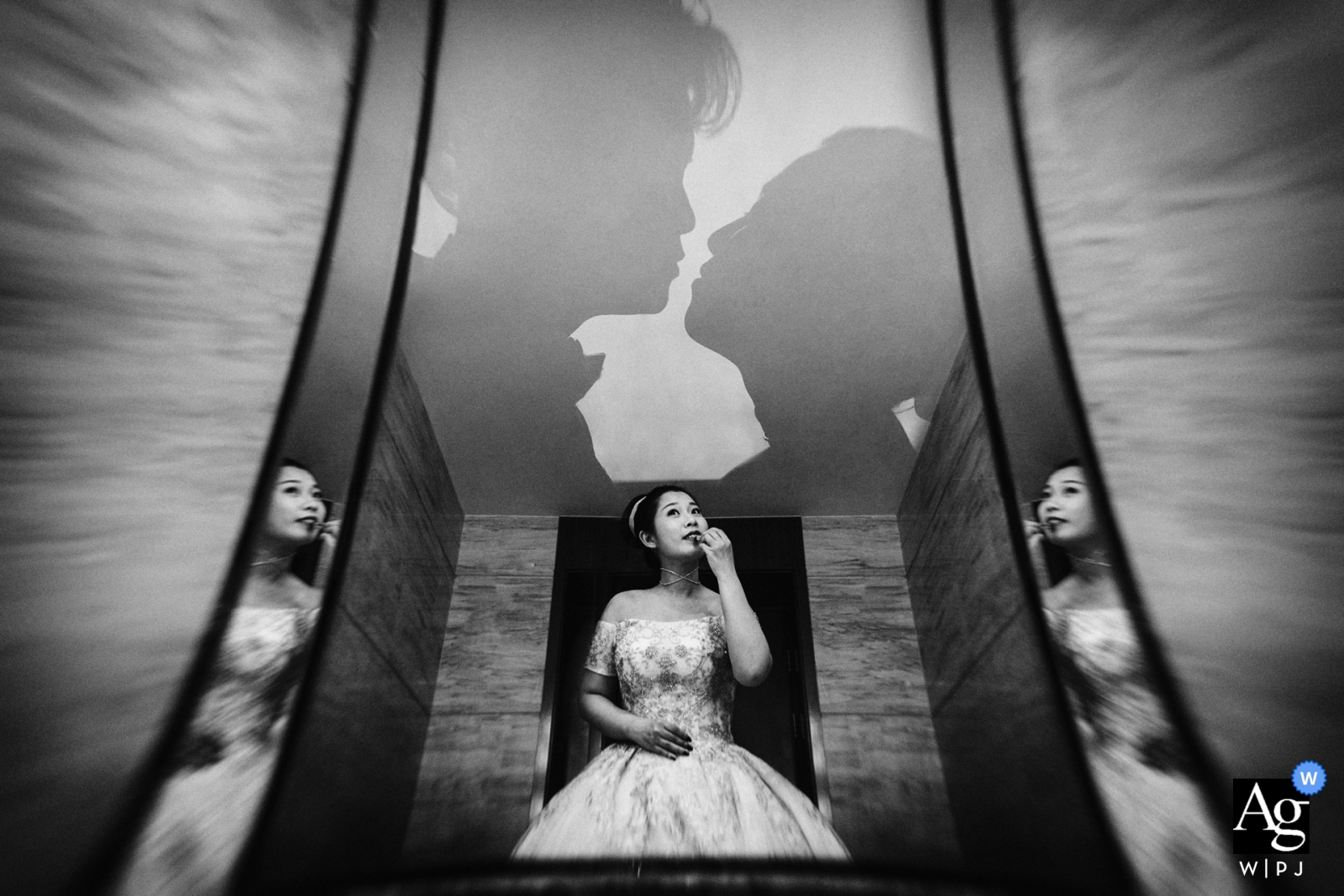 Photo by: <a href="https://www.wpja.com/photos/artistic-wedding-photographers/2444871">Peng Zhang - Beijing beijing wedding portrait of the bride reflected in mirrors as she is getting ready