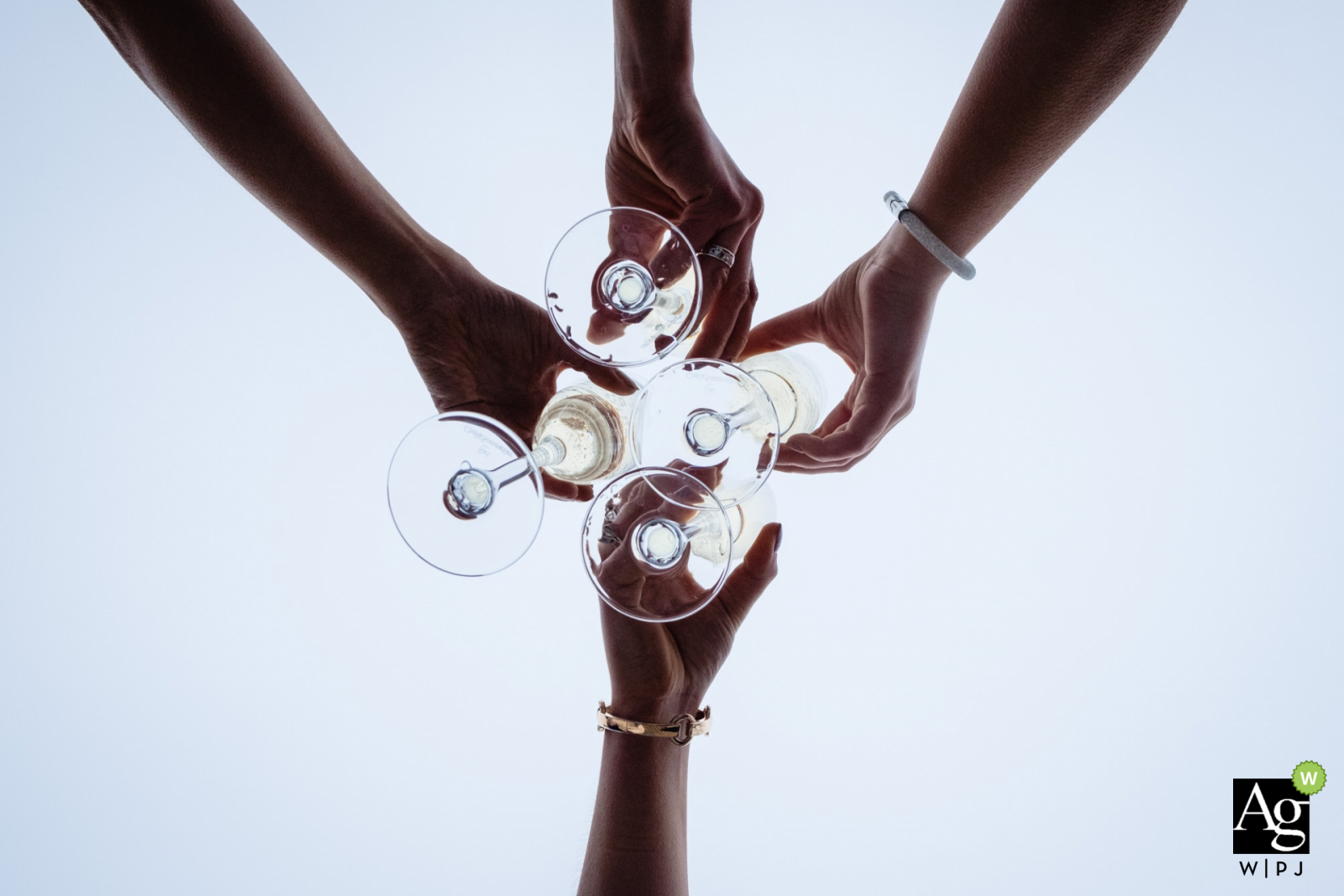 Dublin wedding photographer at Ballymagarvey | Detail photo of the toasting glasses - shot from below