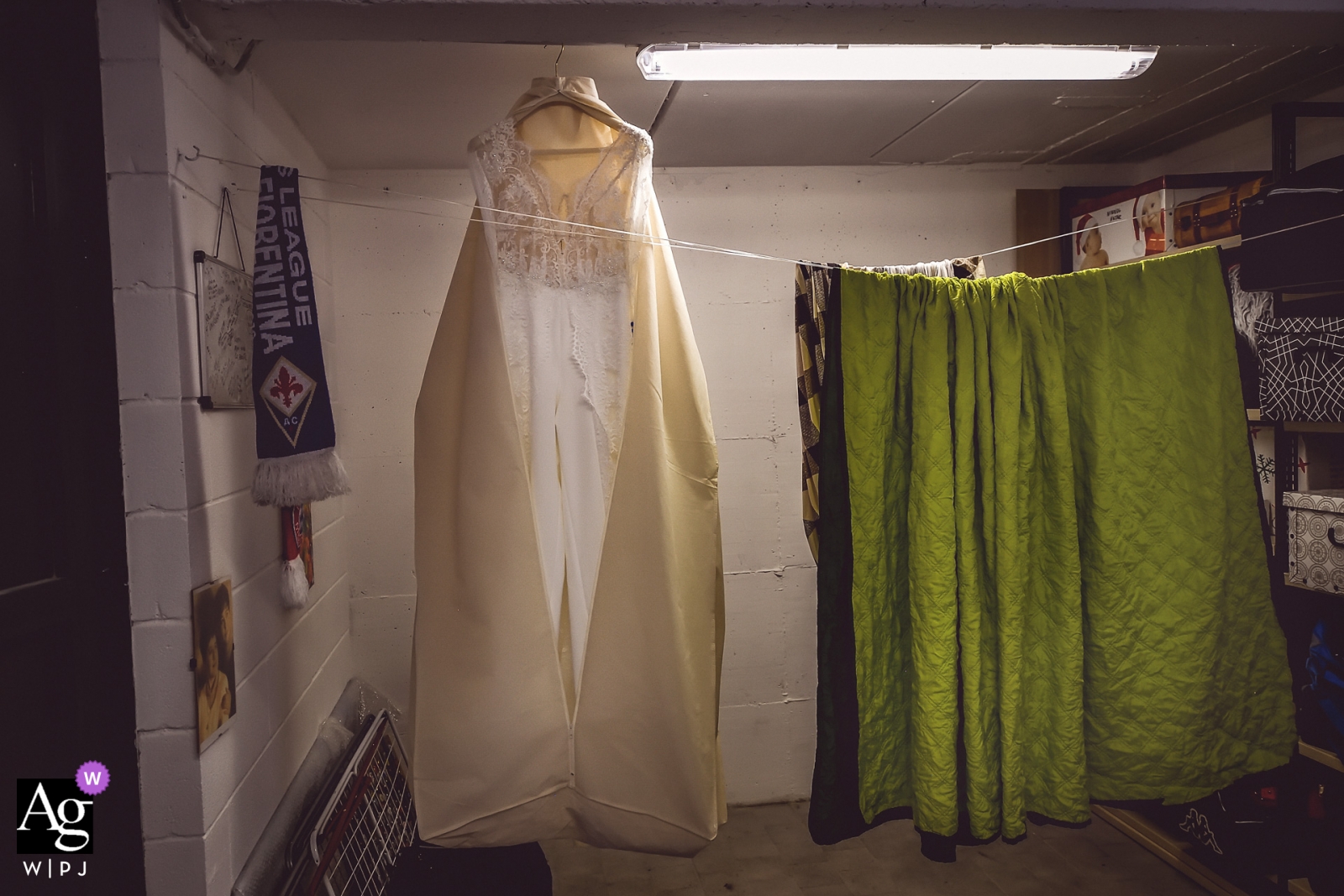 The beautiful wedding dress of the bride-to-be hung from the ceiling of her home in Florence, Il Rinuccino