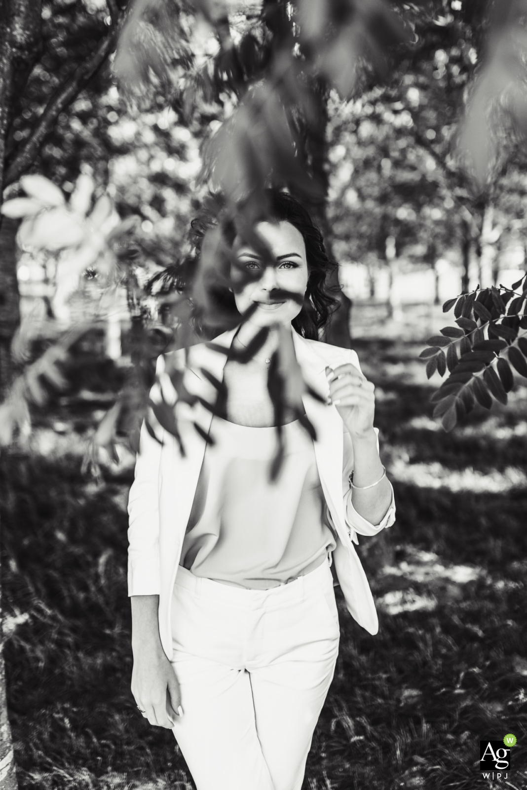 Russia Wedding Photographer making portraits at the Ceremony Location	| Bride photo in black and white under the trees