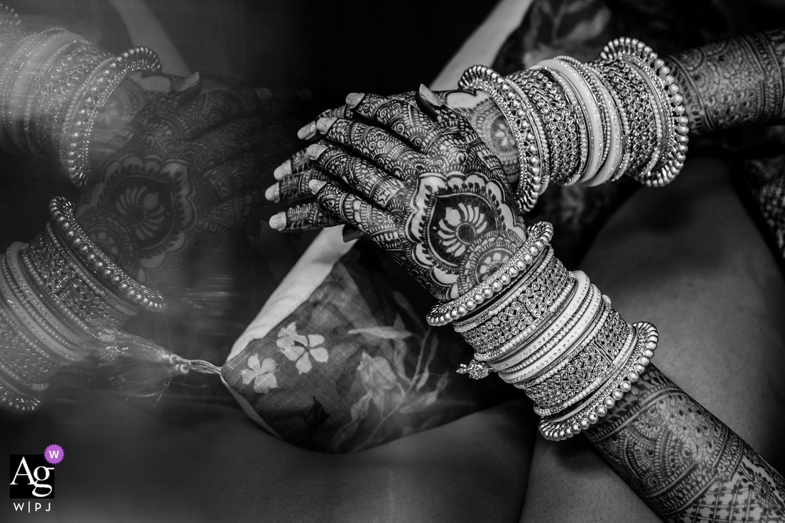 Mumbai wedding detail of the bride's hands decorated with henna 