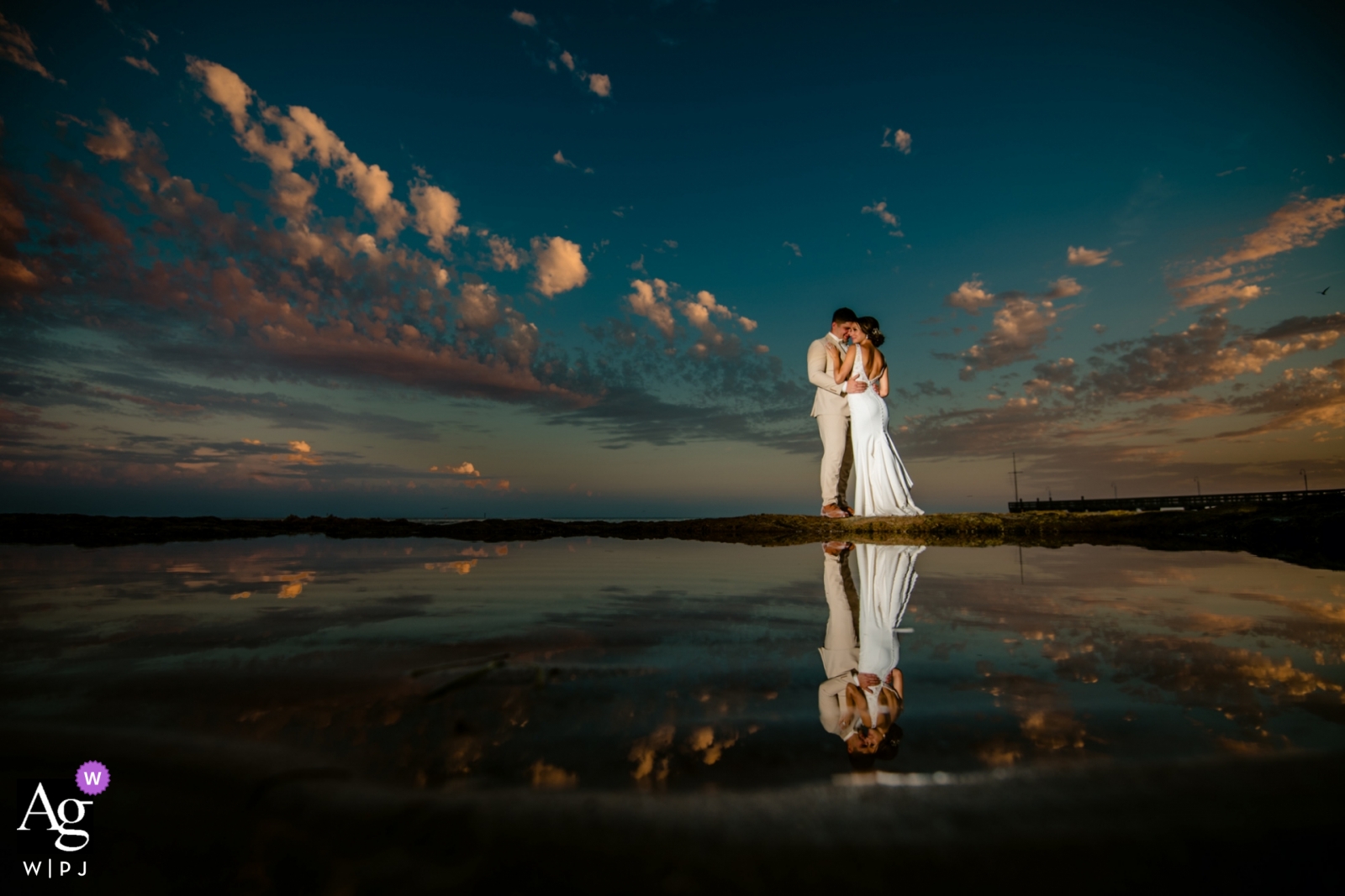 Casa Marina Resort Key West wedding photographer: Sunsets in Key West are something special. When its low tide the limestone rocks expose themselves, which gives you perfect tide pools for reflections.