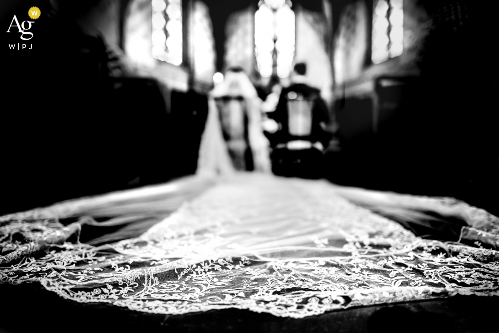 Agen, France wedding detail of the bride's veil at the church