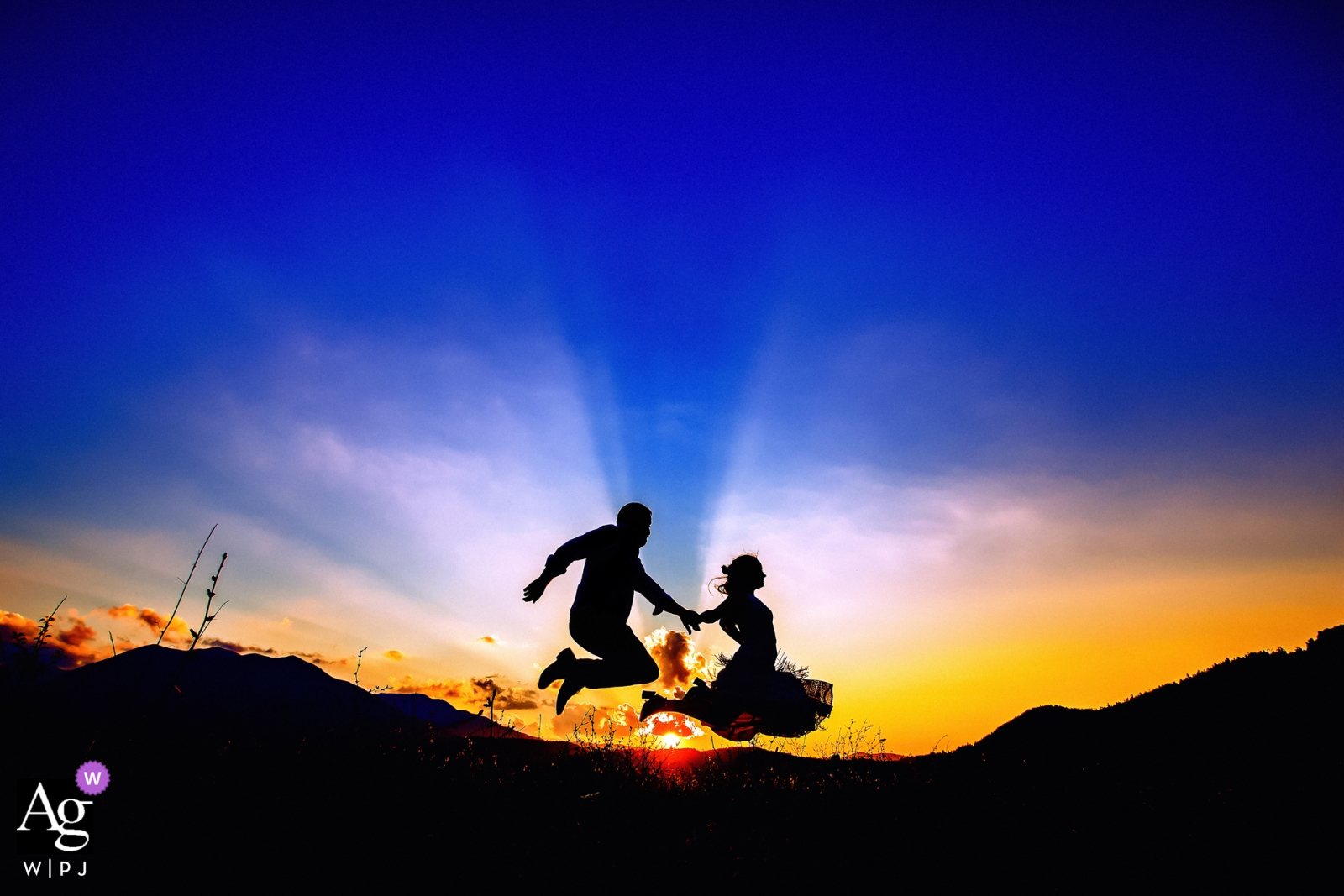 Mavrolithari, Greece - Bride and groom portrait - Jump up to the sky