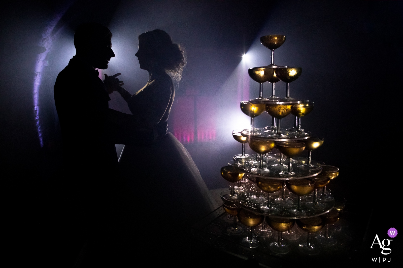 Photo de: <a href="https://www.wpja.com/photos/artistic-wedding-photographers/2558618"> Sylvain Bouzat - Lyon Photographie de mariage en Provence: Un couple et une tour de champagne