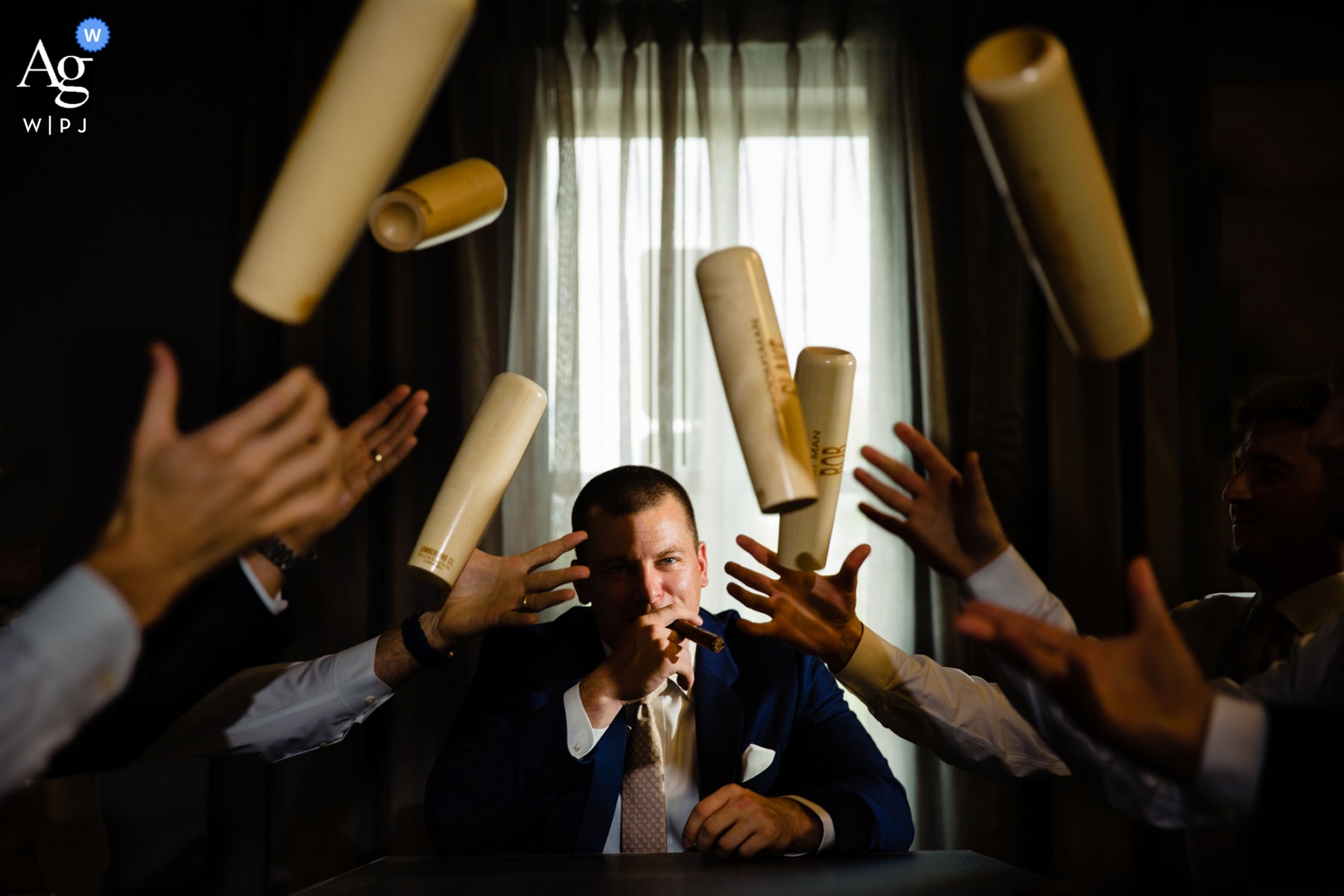 Photo by: <a href="https://www.wpja.com/photos/artistic-wedding-photographers/2558895">Miguel Gonzalez - Abington Pennsylvania The Old Mill in Rose Valley, PA wedding photographer about the groom picture: He got them these wood cups. I incorporated them in a shot creatively.