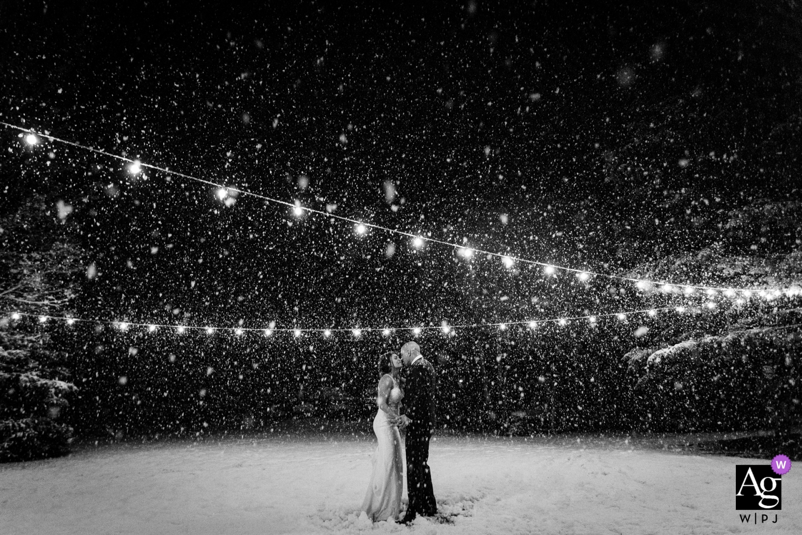 Victor, Idaho portrait in snow of Bride and groom in this creative photo at night Victor, Idaho portrait in snow | Bride and groom creative photography at night