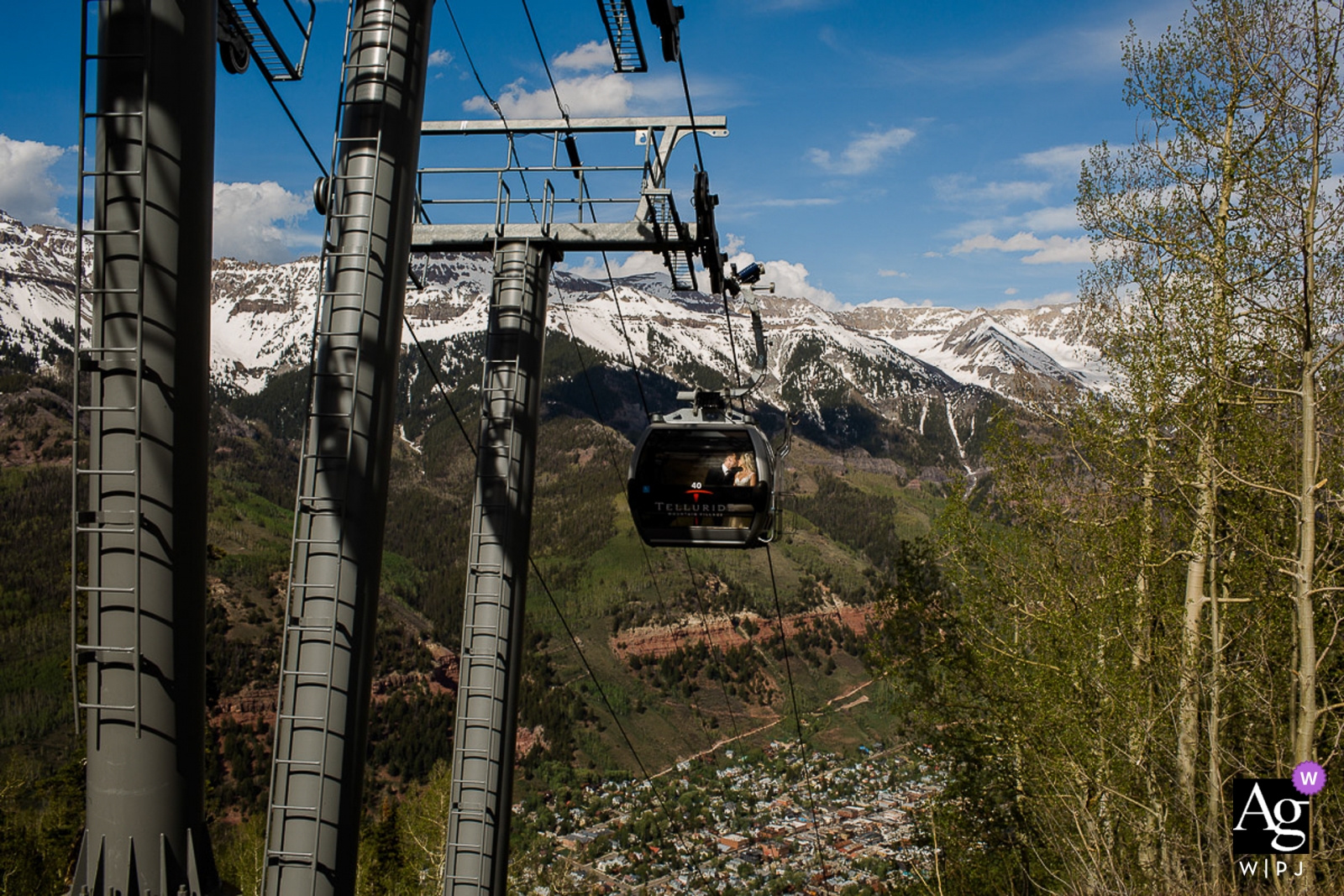 Colorado Ski Resort wedding image from a gondola Colorado Ski Resort Couple going down gondola | CO wedding portraits