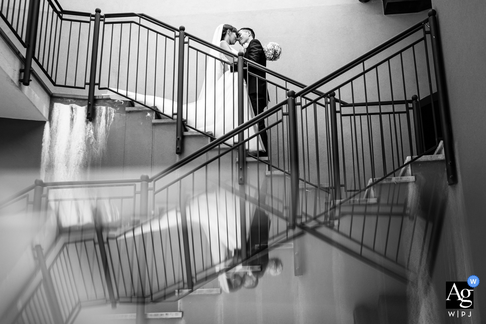 Portopiccolo Sistiana, Trieste, Italy Wedding Photography on the stairs of the Bride and groom reflections Portopiccolo Sistiana, Trieste, Italy Wedding Photography | Bride and groom reflections