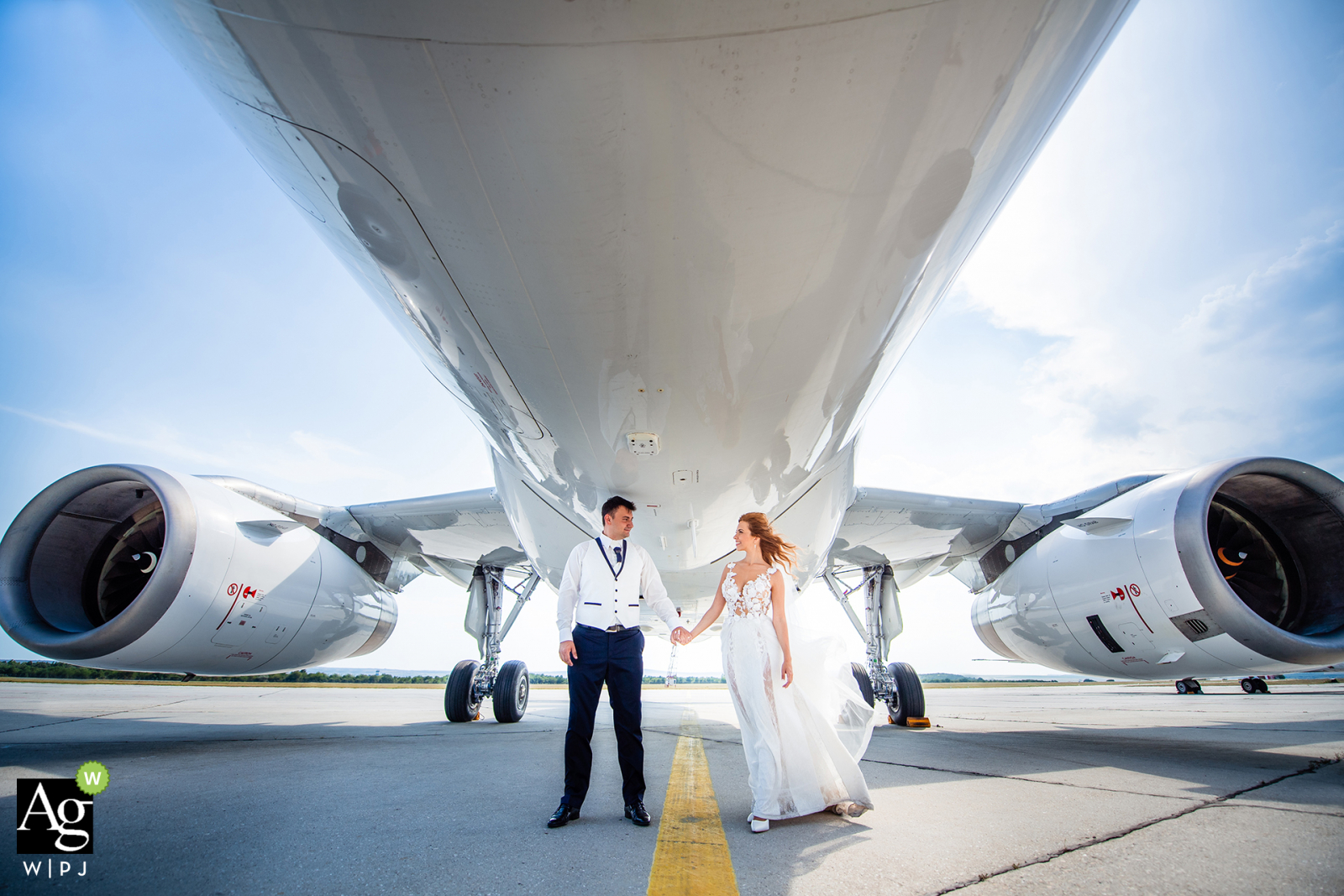 Varna, Bulgaria fine art wedding portrait image showing Love is in the air plane