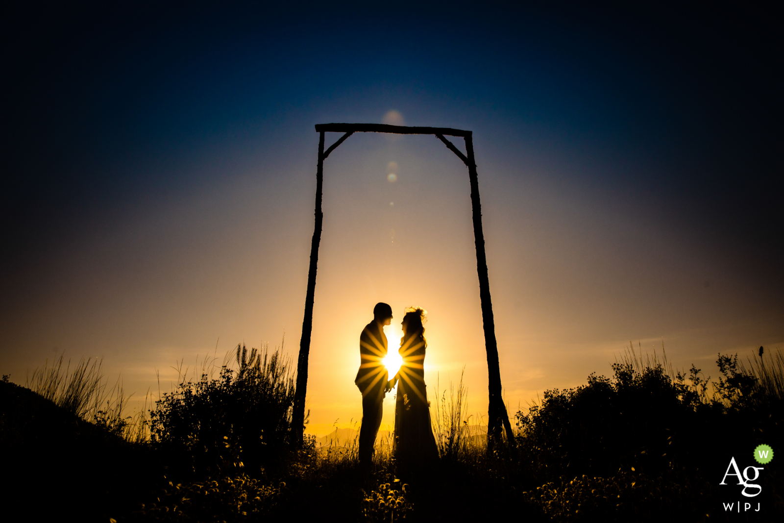Photo by: <a href="https://www.wpja.com/photos/artistic-wedding-photographers/2588867">Emre Nesli - İstanbul Istanbul Mersin Divan Otel fine art wedding portrait image of a couple in a geometric frame