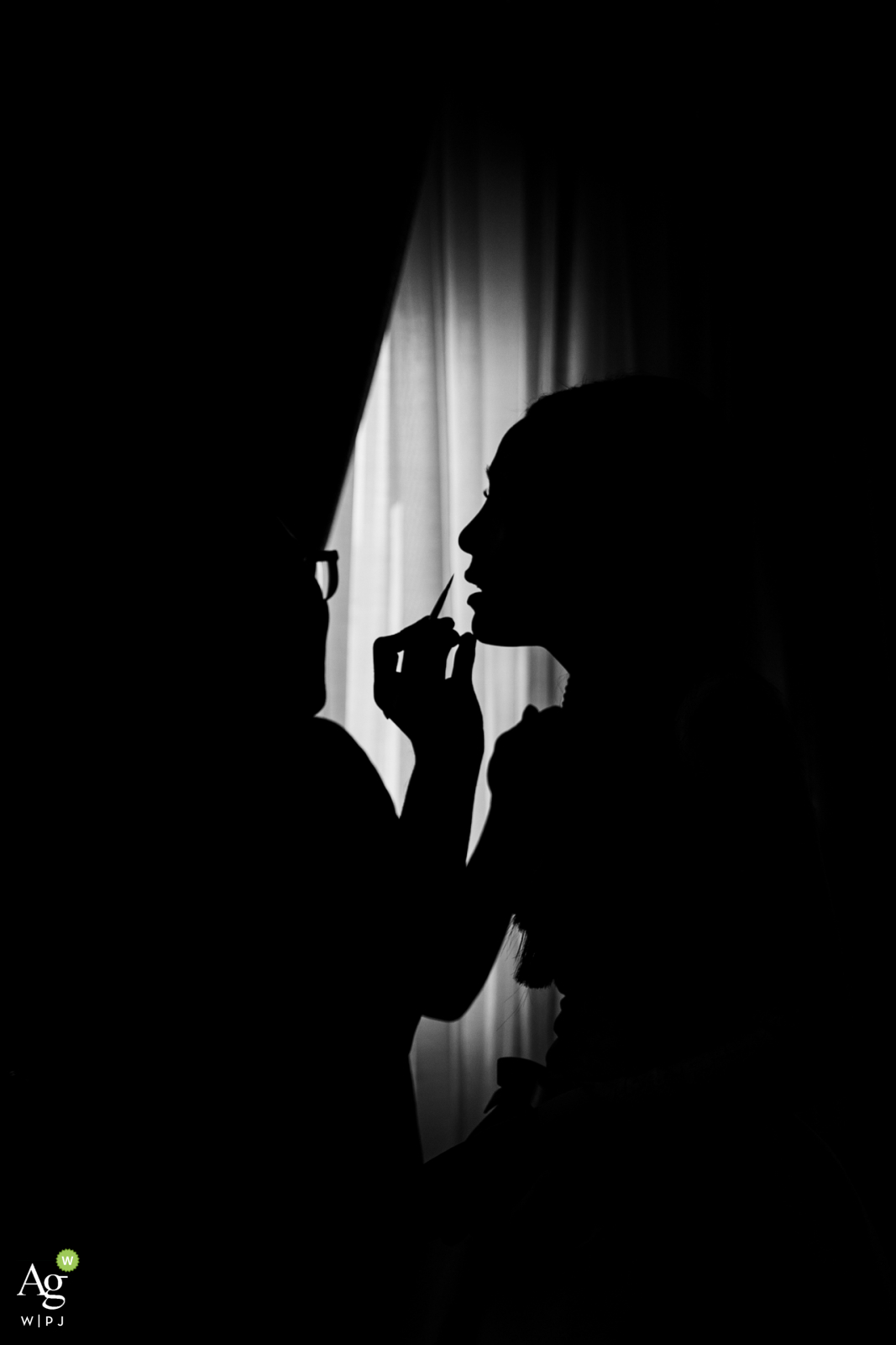 Photo by: <a href="https://www.wpja.com/photos/artistic-wedding-photographers/2595103">Chaiyasith Junjuerdee - Fulham London Praya Palazzo, Bangkok fine art wedding detail photography picture created during the Getting Ready of lipstick makeup going on