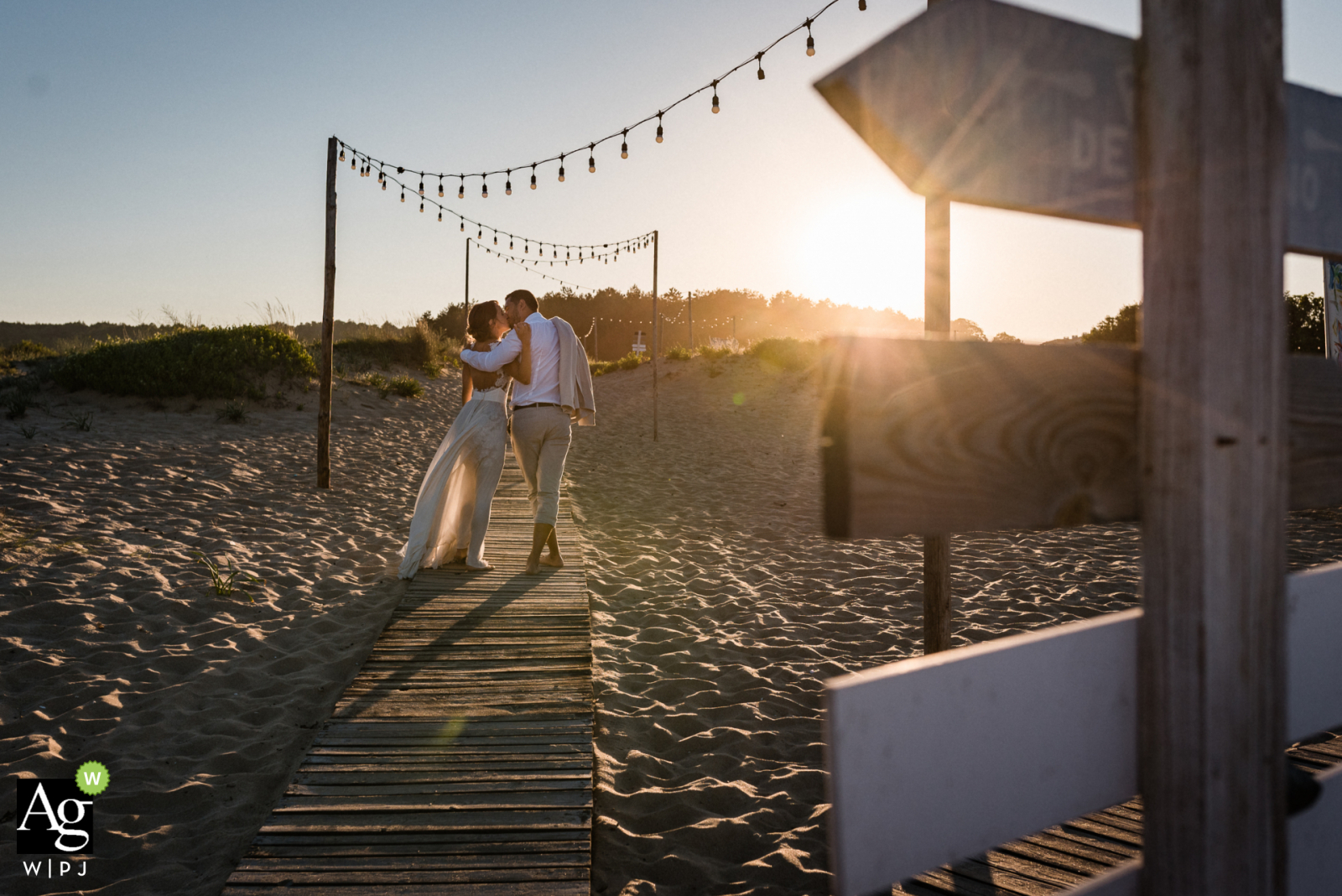 Sozopol, Bulgaria creative wedding day Photo from the shoot we did with the couple, right after the ceremony on the beach boardwalk over the sand