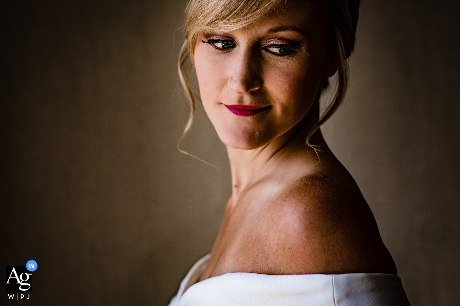 A bride takes a moment while getting ready before her Meson Sabika wedding in Naperville, Illinois