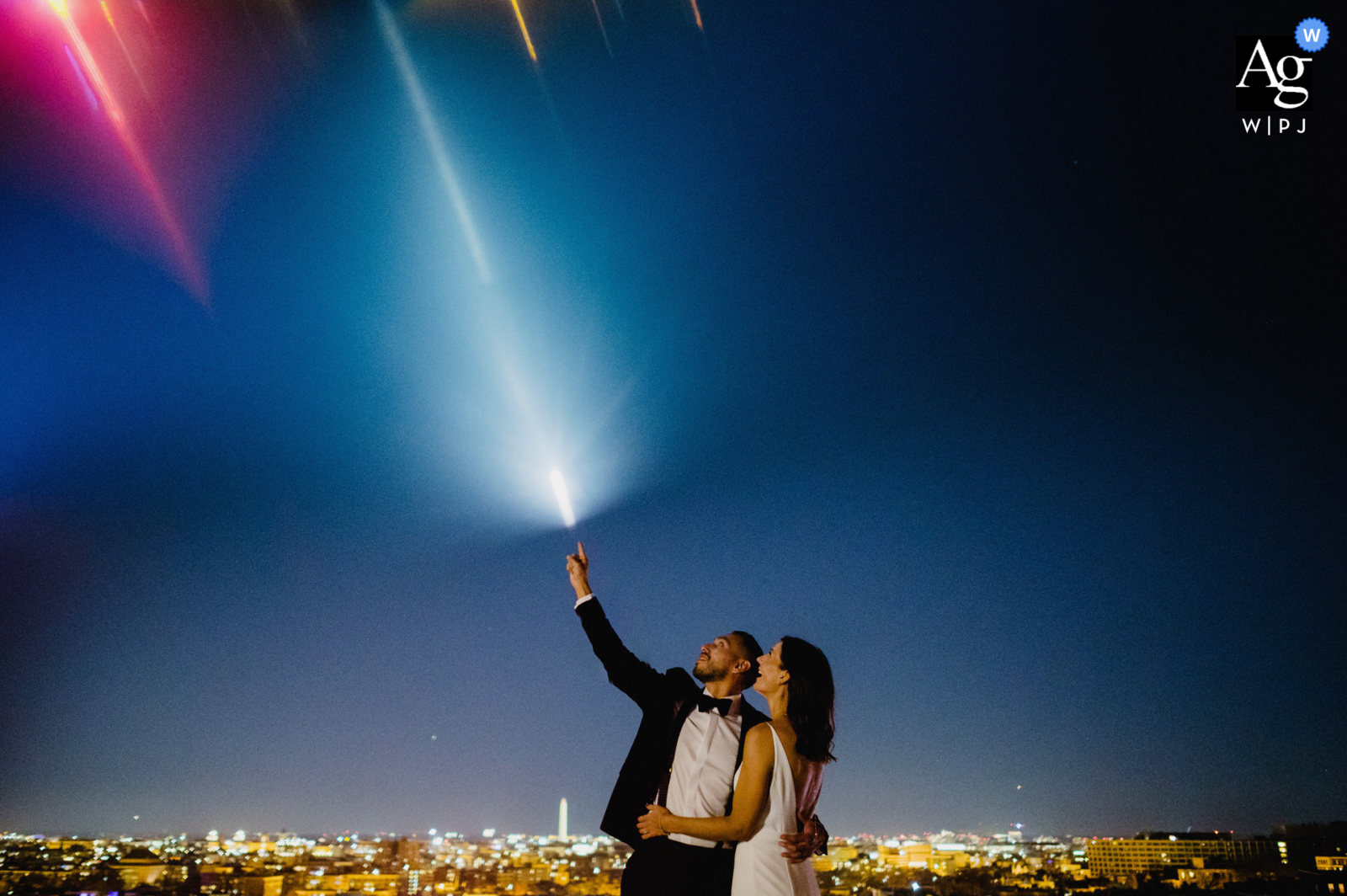 The Line, DC artistic wedding photo showing the groom is touching the shooting star The Line, DC artistic wedding photo showing the groom is touching the shooting star