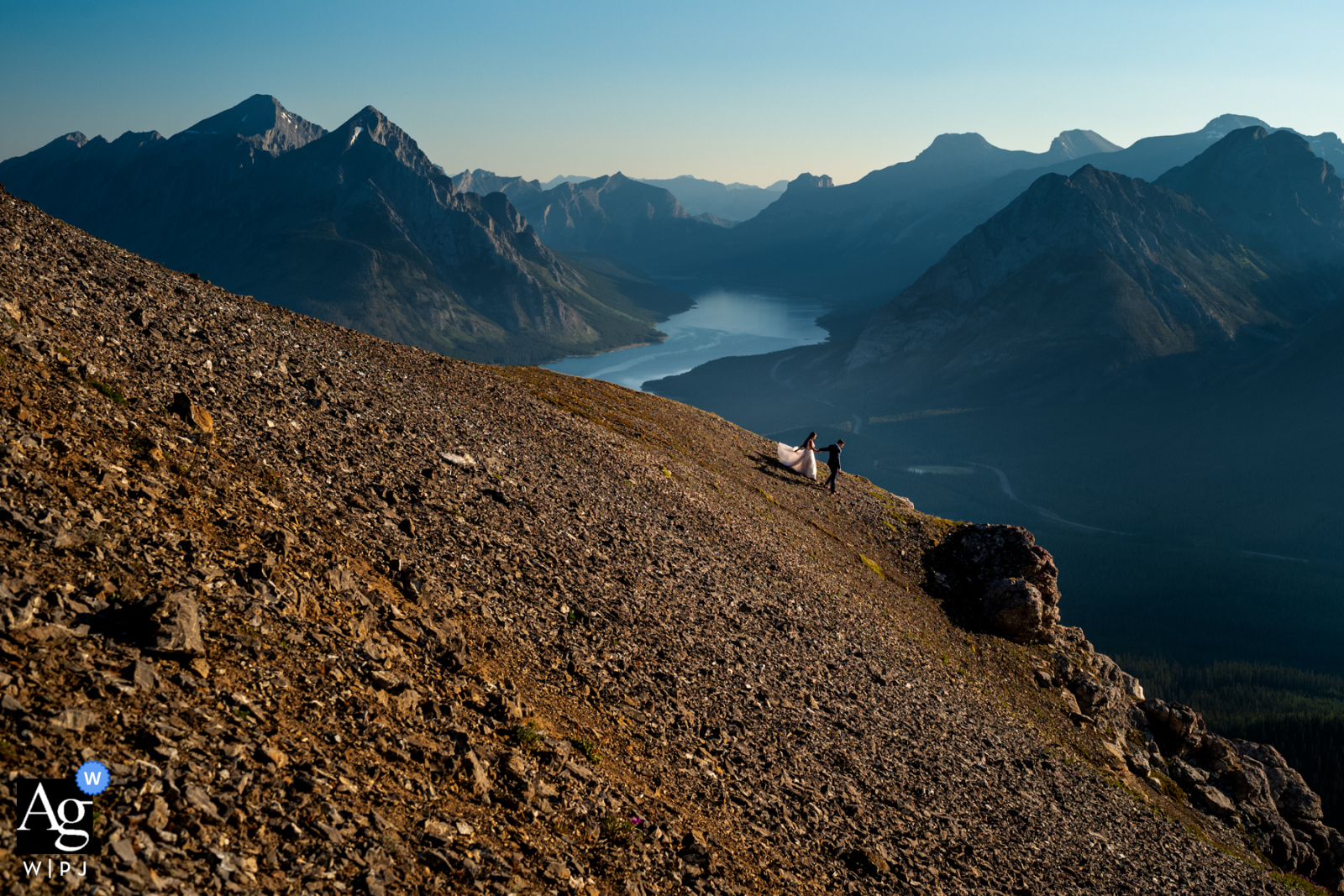 AB artistic wedding portrait of a couple at Tent Ridge, Kananaskis, Canada Walking on the Ridge