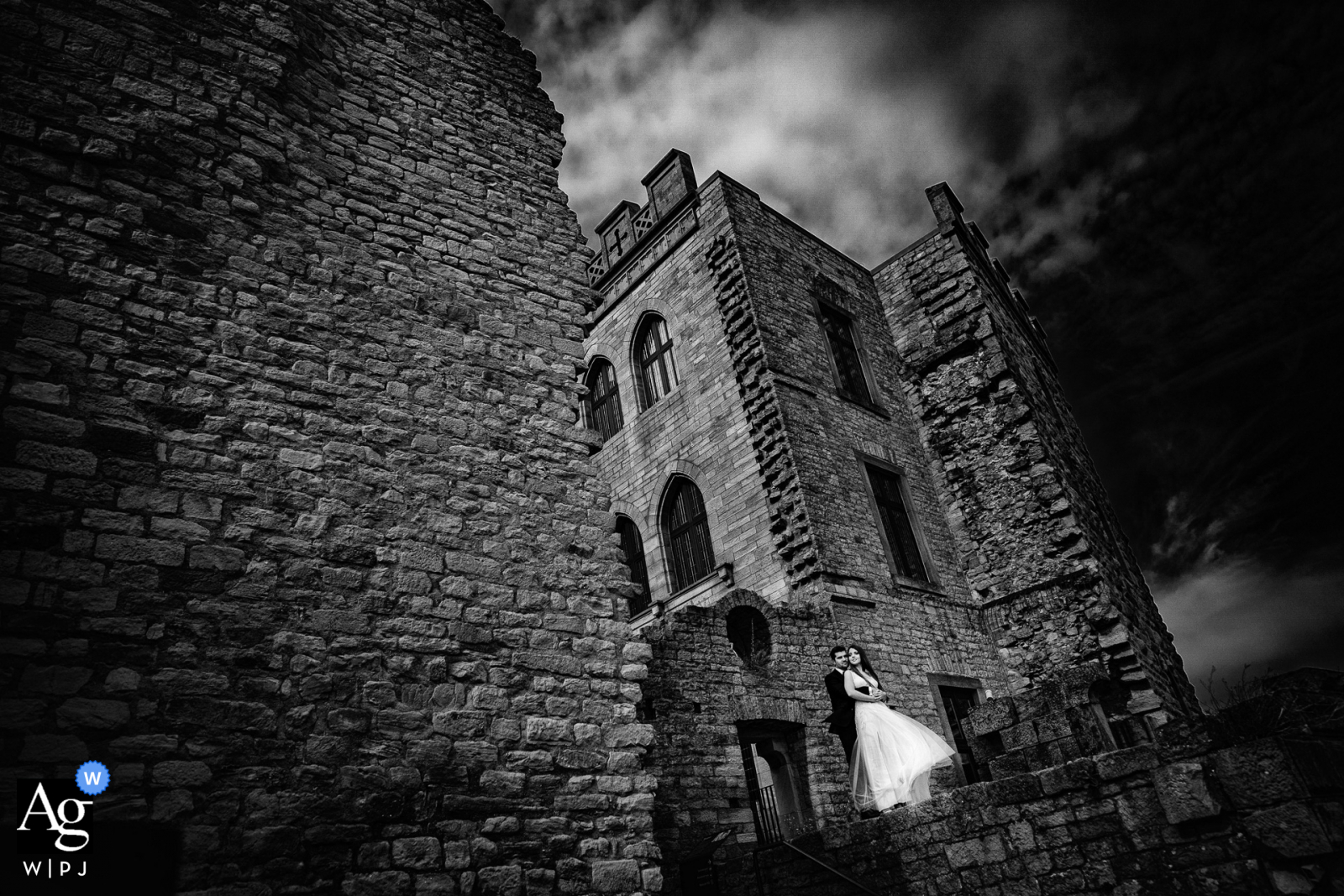 Hambacher Schloss fine art wedding couple portrait with the dramatic castle as the background Hambacher Schloss fine art wedding couple portrait with the dramatic castle as the background