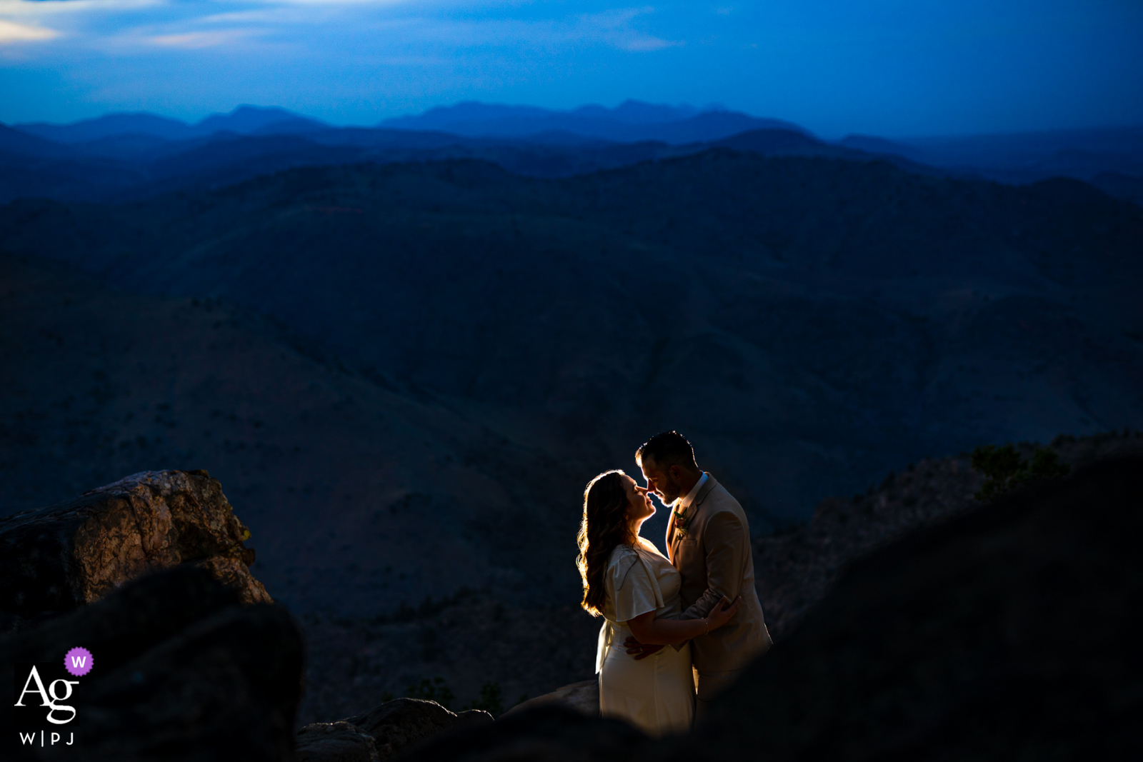 Blue hour CO wedding photo from Lookout Mountain - Golden as the couple posed for portraits after getting married at the courthouse Blue hour CO wedding photo from Lookout Mountain - Golden as the couple posed for portraits after getting married at the courthouse