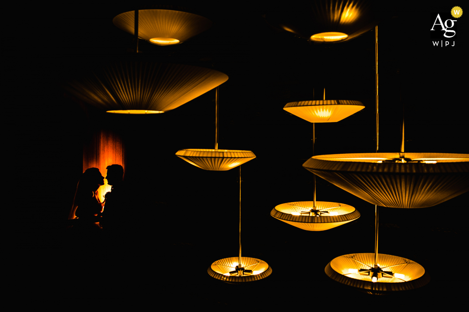 World's best and most unconventional Turkish wedding portraits from Mersin Hilton Hotel of a couple posing through the lights of hotel World's best and most unconventional Turkish wedding portraits from Mersin Hilton Hotel of a couple posing through the lights of hotel