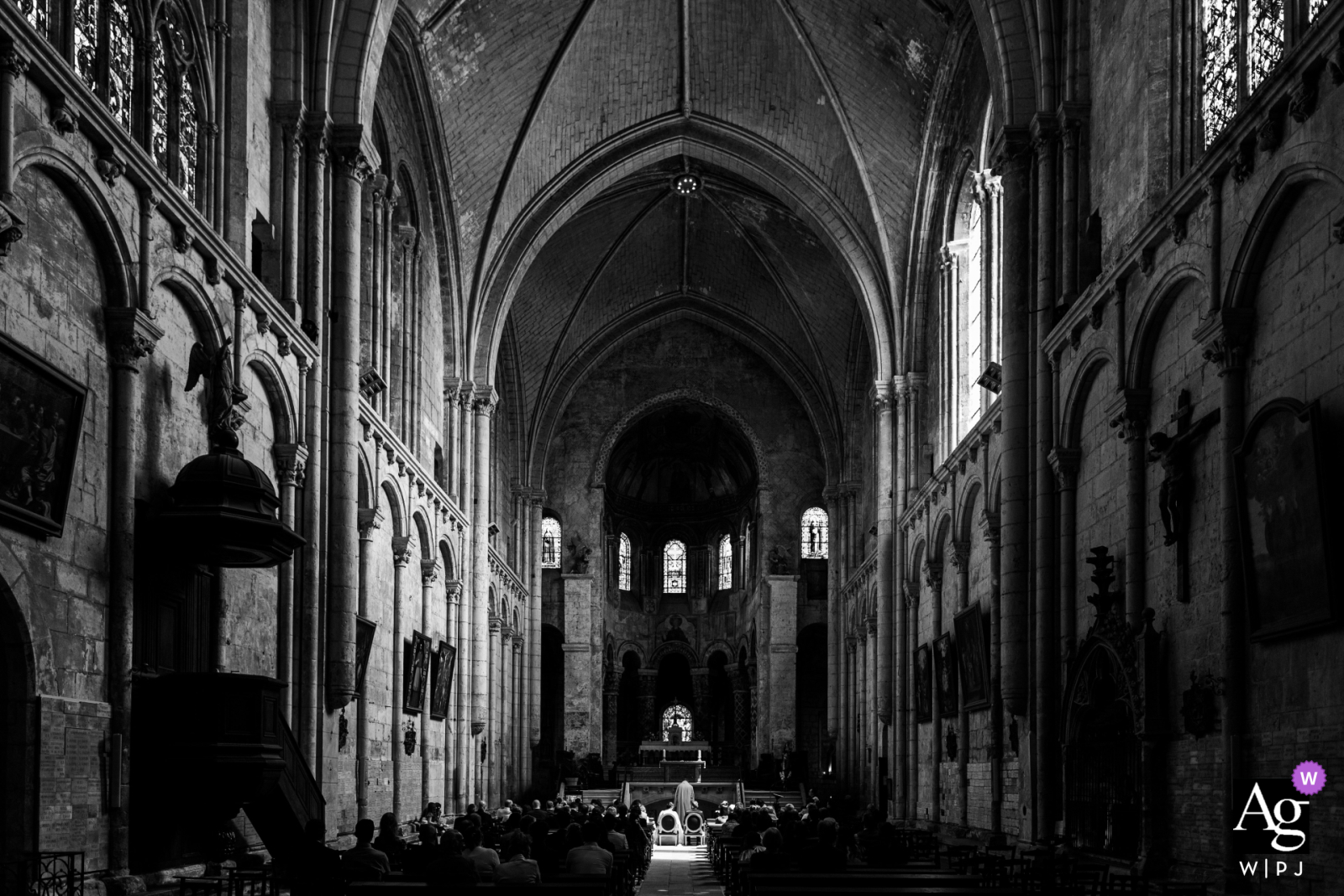 In Poitiers, Vienne, a stunning perspective captures the grandeur and beauty of a church where the ceremony takes place, showcasing the architectural elegance and serene atmosphere of the Old World space.