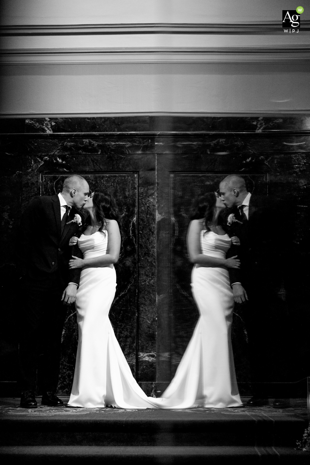 Black and white portrait of bride and groom, reflected in grand ballroom doors, Boston Park Plaza Hotel