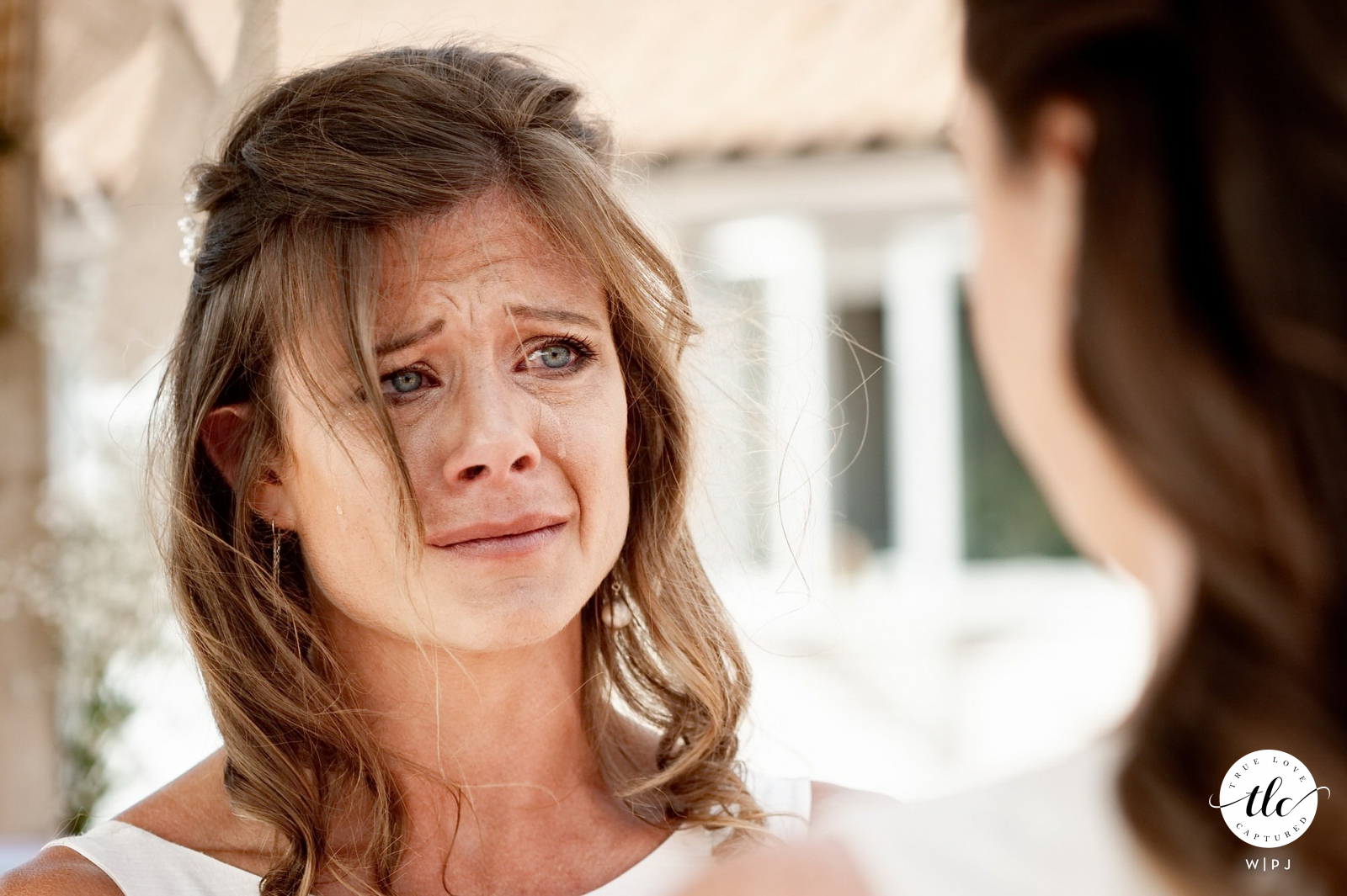  Folly Farm, Somerset, UK  Crying bride image from her wedding ceremony