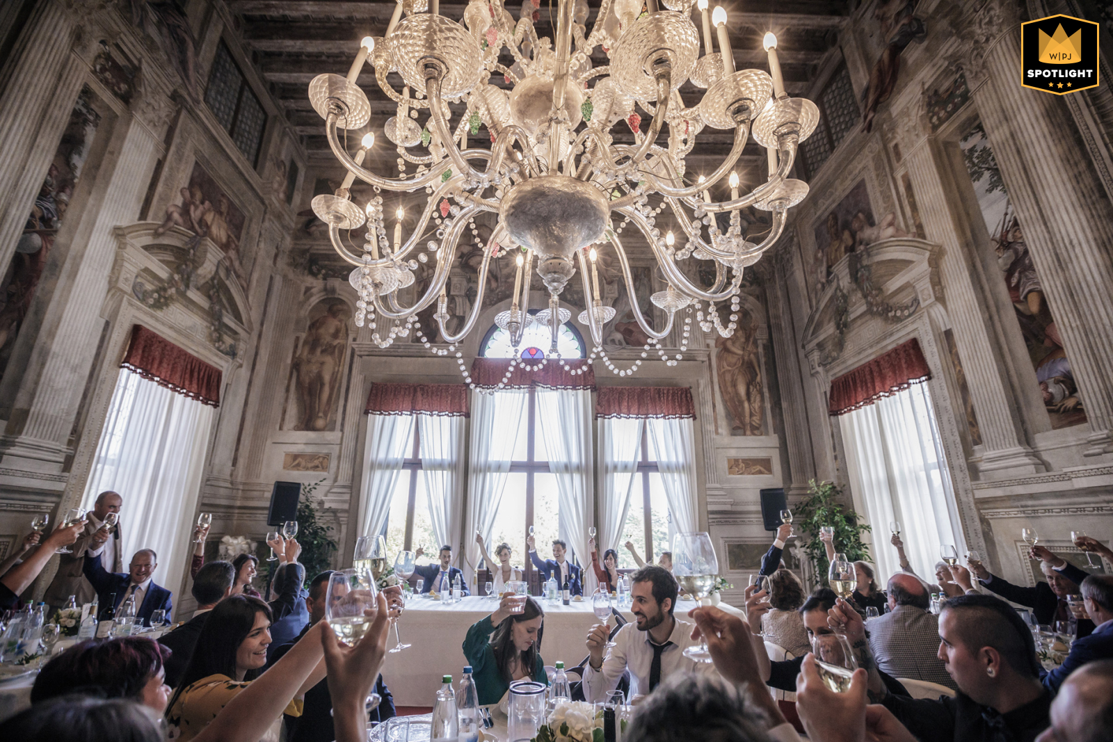 A heartfelt and scenic toast to the newlyweds at Villa Godi Malinverni in Italy, captured during their reception at the Palladian villa on their wedding day.