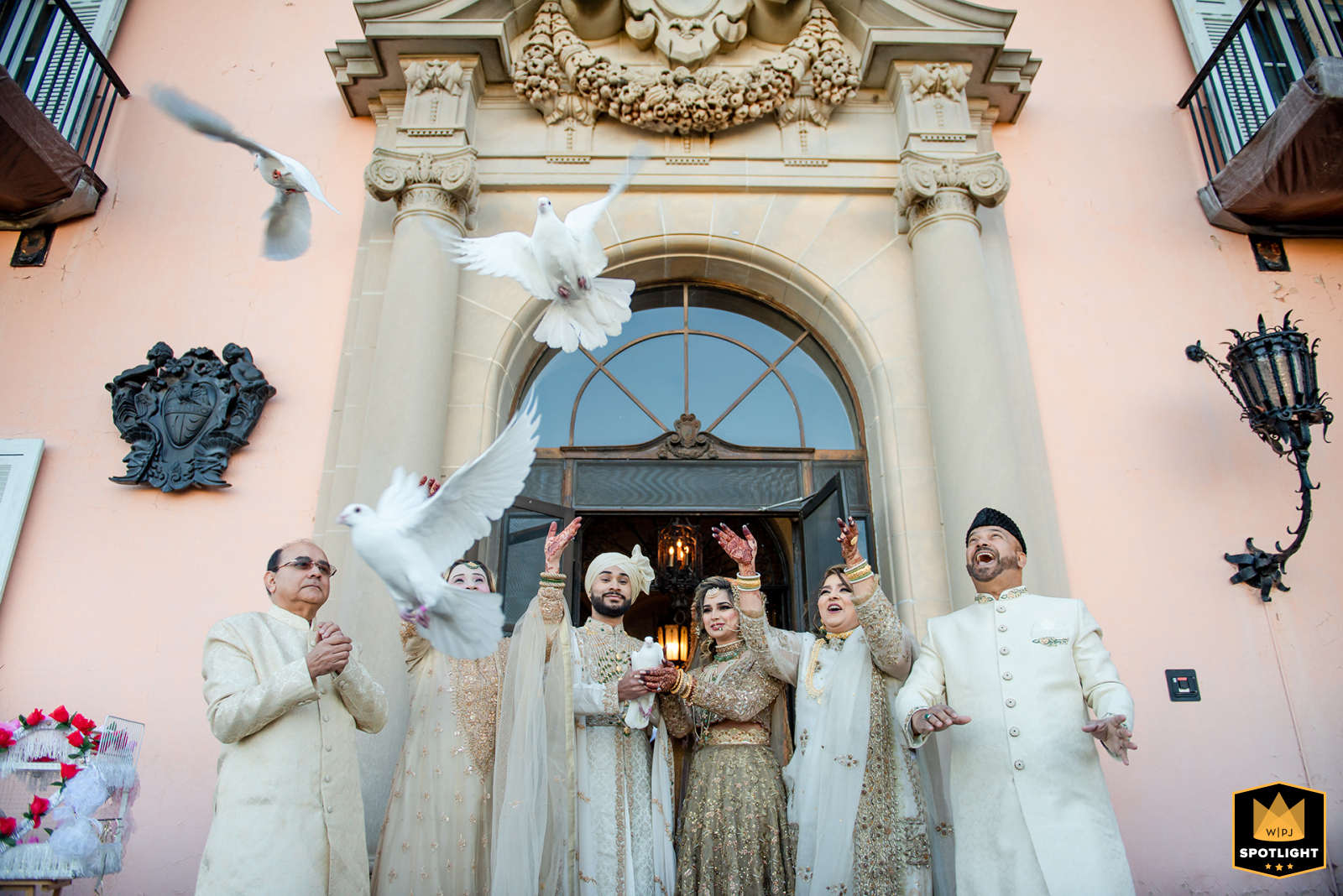 The winning WPJA Spotlight image captured the sentimental moment of a bride and groom surrounded by their families at the Loyola at Cuneo Mansion and Gardens in Vernon Hills, Illinois, as they released pigeons in front of the wedding venue.
