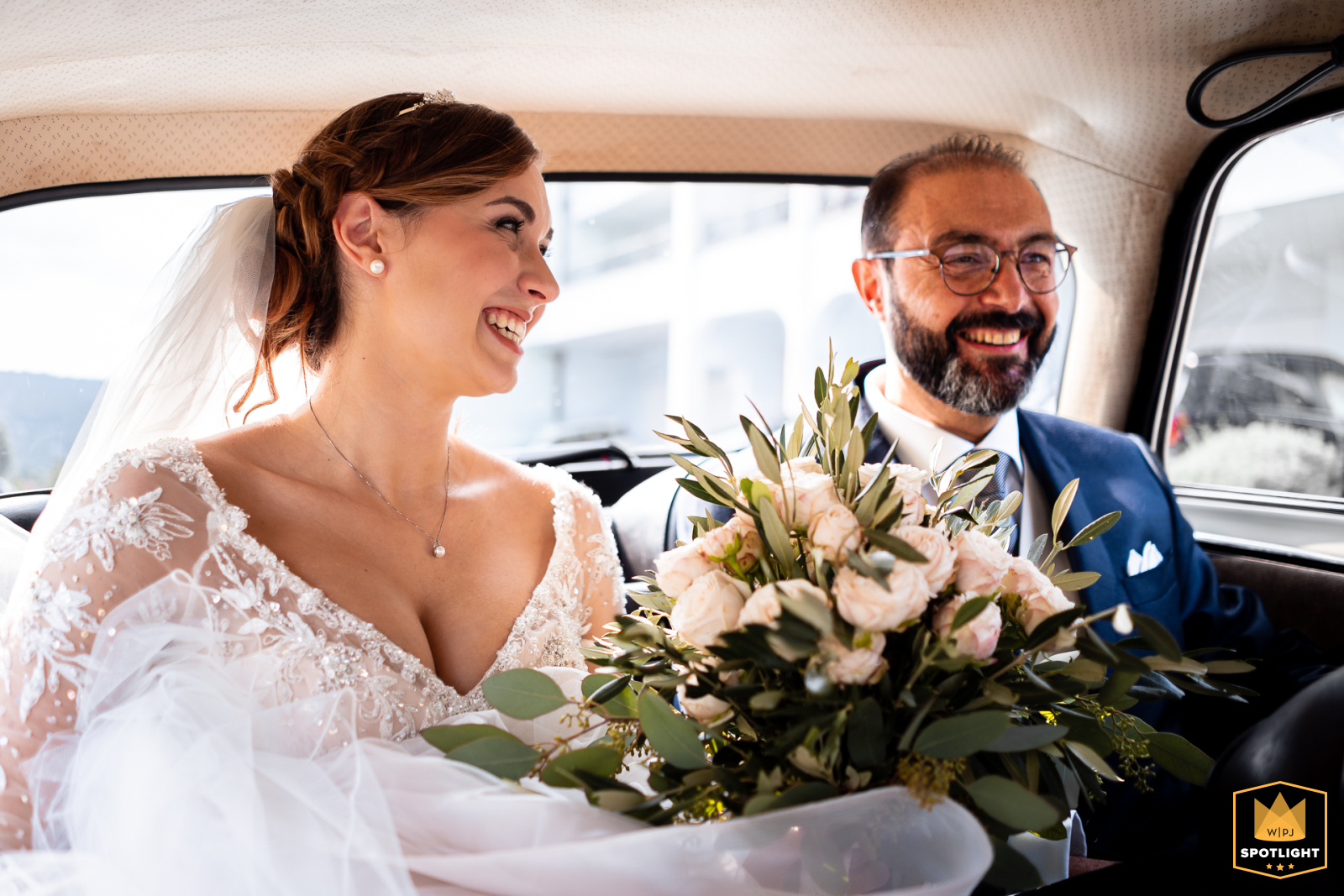 A heartwarming moment was captured in an award-winning image at the WPJA Spotlight, as a beaming bride and her father shared a joyous laugh during a backseat ride to the ceremony in Trieste, Italy.