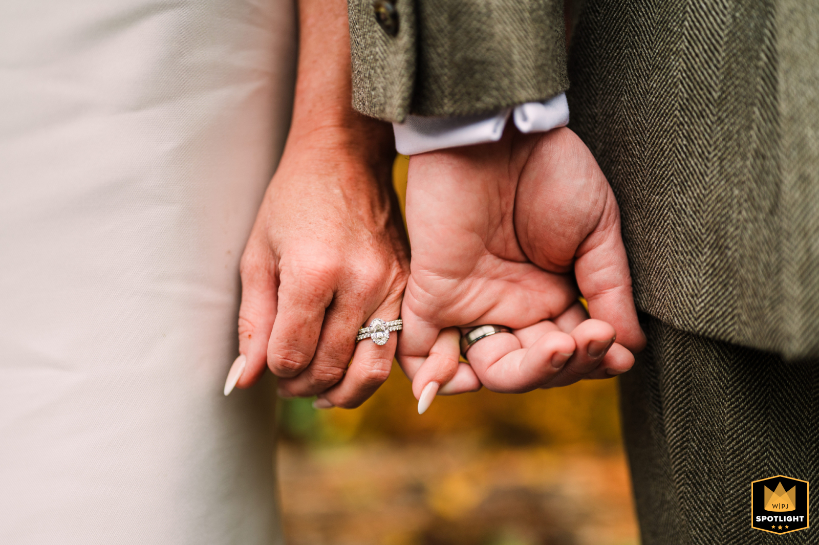 Snoqualmie Pass Detail: Pinkies and Wedding Rings A detail shot from Snoqualmie Pass, WA: the bride and groom link pinkies, showcasing their new wedding rings.