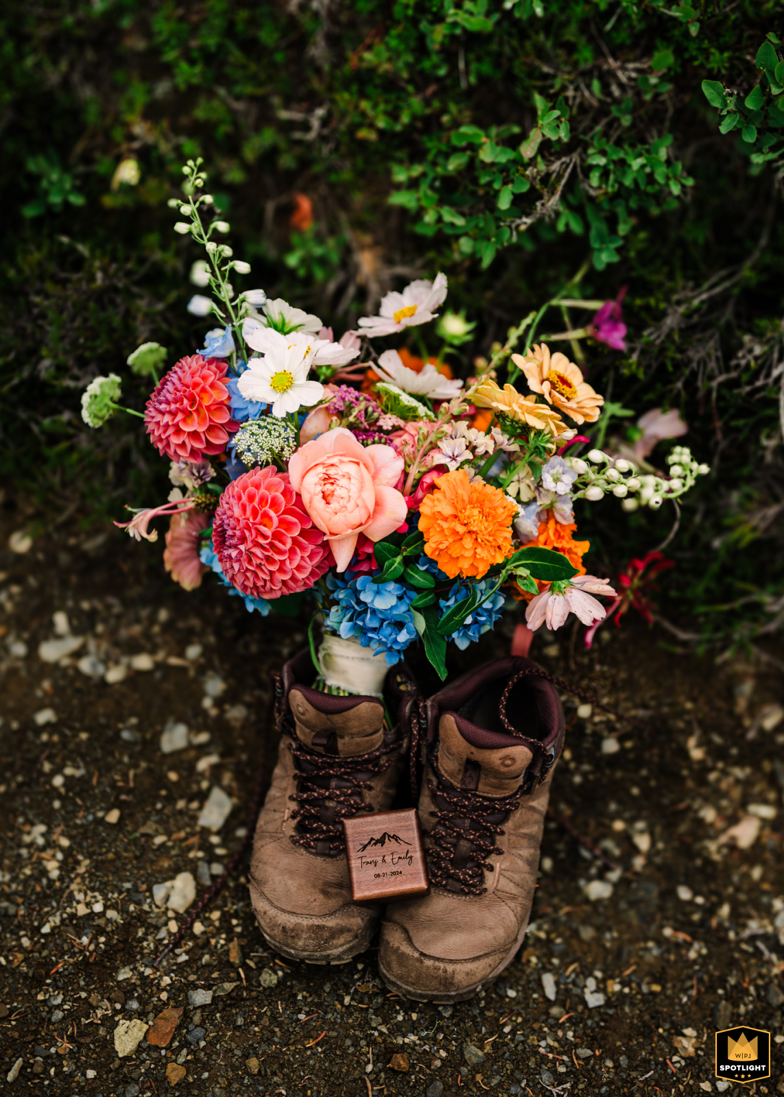 Mt. Baker Wedding Details: Bouquet, Hiking Boots, and Ring Box A wedding bouquet rests in a bride's hiking boots on a trail at Mt. Baker, WA, alongside a personalized ring box.