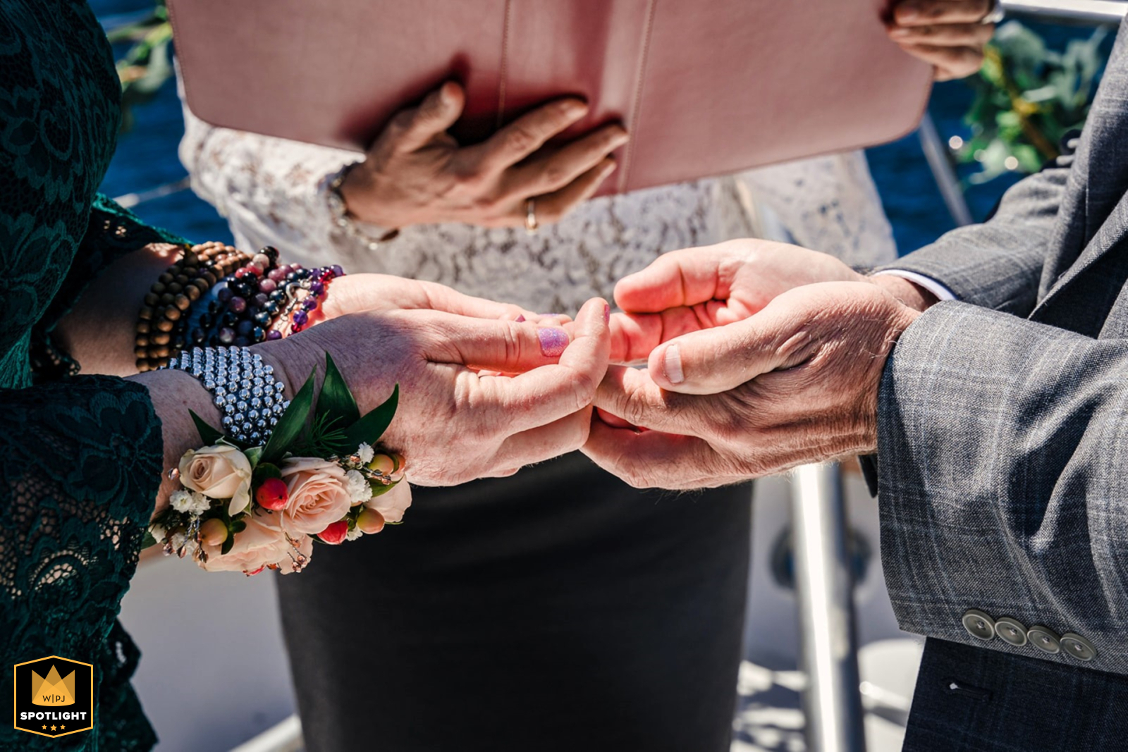 In South Lake Tahoe, California, the couple seals their love by joining hands during the ceremony, a moment capturing their heartfelt promises and vows.