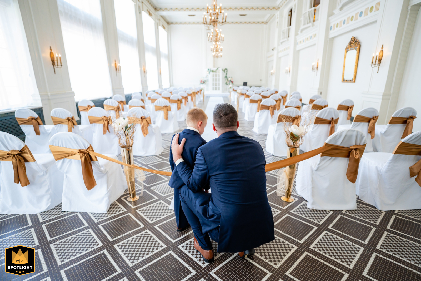 At The Washington Hotel in Washington, PA, Sam's son shares a special moment with his soon-to-be stepfather before the wedding ceremony begins.