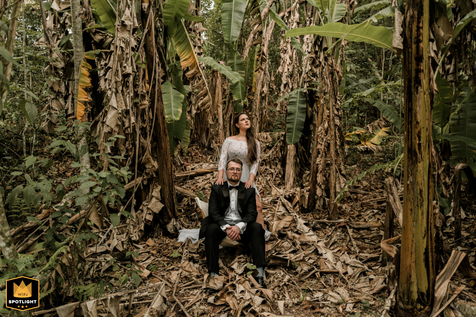 Bride And Groom Share A Connected Portrait Surrounded By Forest In São Paulo, Brazil A couple’s portrait in São Paulo highlights the love and connection between the bride and groom, framed by the woods’s natural ambiance.