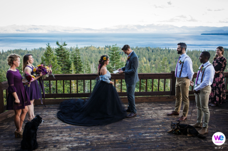 Elopement Photography of The bride, groom, and their friends at rented house with a sweeping view of the Lake