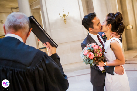 They got married at City Hall with a very humorous officiant, making the atmosphere light and joyful