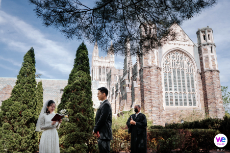 University Wedding Photo from outdoor ceremony near historic chapel on campus