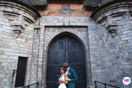 Capturing a couple's eternal love, framed by an enchanting old world door. A truly timeless wedding photo.