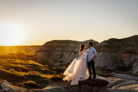 True Love Engagement Portrait Session in Drumheller, AB displaying a couple together under the warm Sunset light 