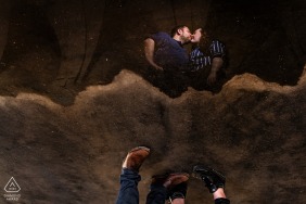 In Nancy, France, we see the couple's loving embrace reflected in a puddle.