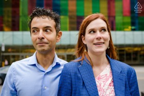This joyful engaged couple enjoys a lighthearted session in Montreal, Quebec, making funny faces at one another to showcase their quirky personalities and the fun side of their relationship.
