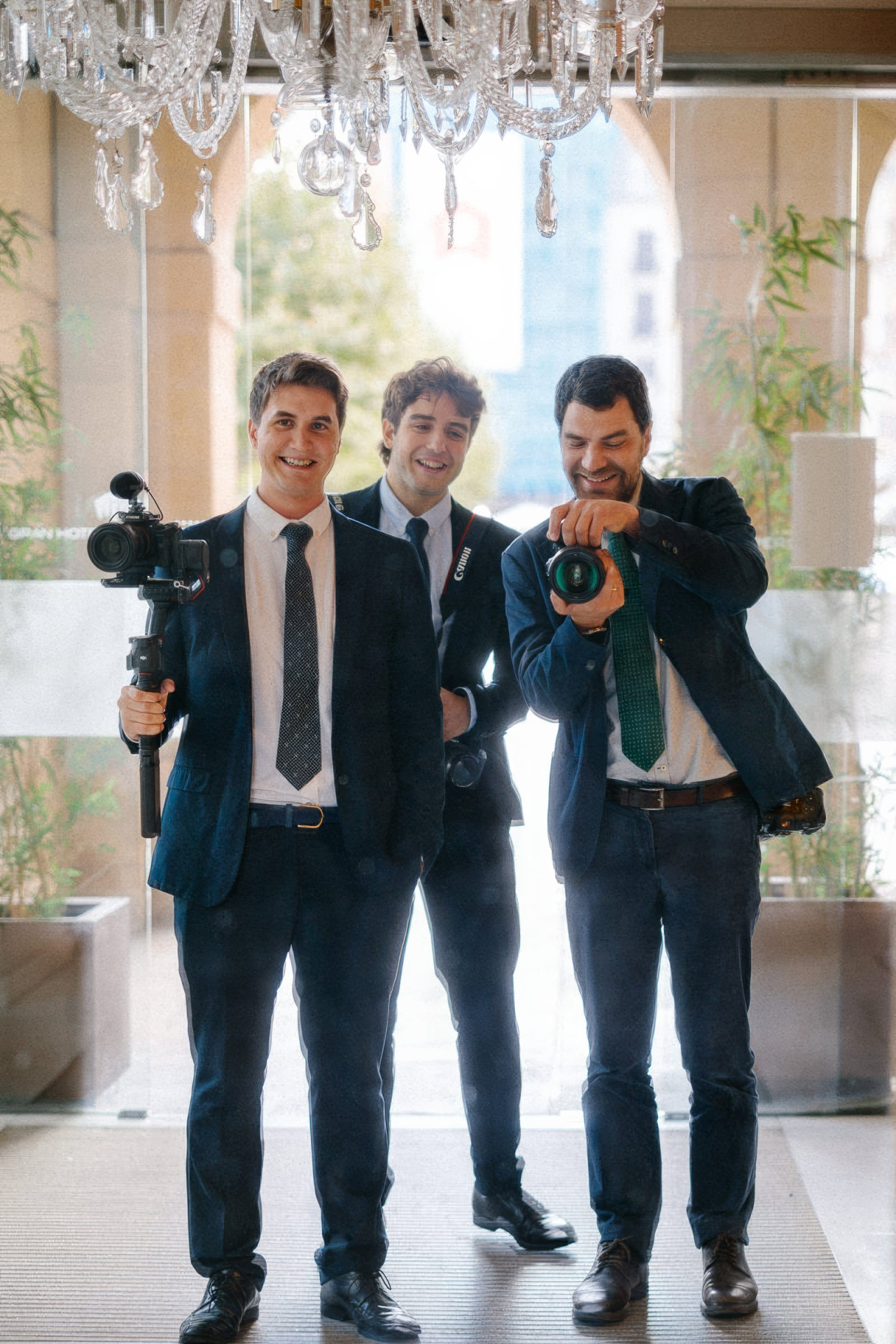 Washington City wedding photographer Matt Kolf, shooting a selfie in the mirror with other photographers.
