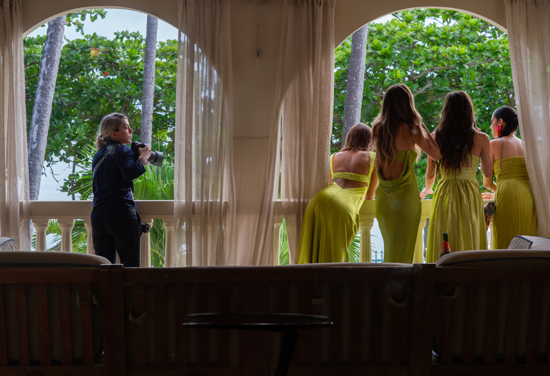 Vero Ruiz, a wedding photographer at work in Rincón, Puerto Rico Vero Ruiz photographer working at a wedding in Rincón, Puerto Rico