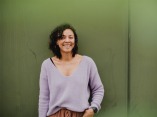A lifestyle portrait of Sandy Manancourt, a documentary wedding photographer