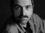 BW studio portrait of Pedro Vilela of Portugal, a Lisbon wedding and elopement photographer