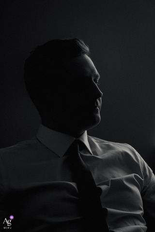 Sheraton Hotel Downtown Montreal wedding photographer: Groom was sitting listening to his friends and the light hit him perfectly here - love this type of light.