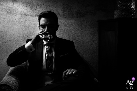 Picture during getting ready at Palacio de San Esteban, Salamanca, Spain - The groom enjoying a coffee 